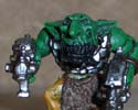 Basecoated Grot with a pair of 2nd Edition Ork pistols